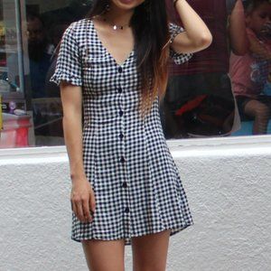 Cute gingham button-down dress with ruffles